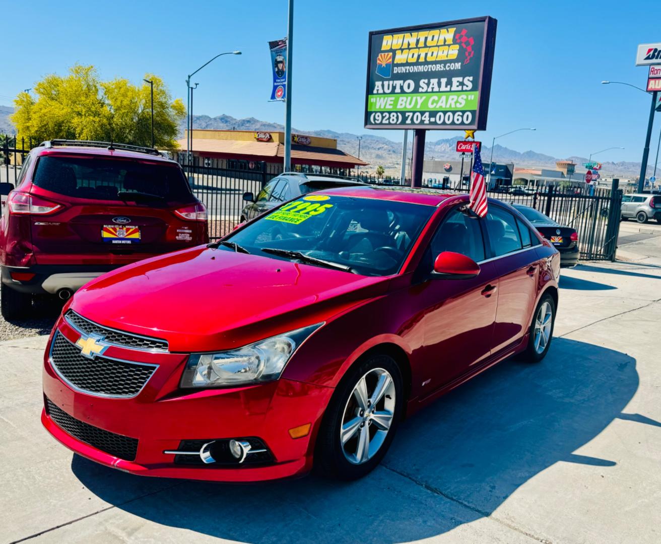 2012 Red Chevrolet Cruze LT , located at 2190 Hwy 95, Bullhead City, AZ, 86442, (928) 704-0060, 0.000000, 0.000000 - 2012 Chevrolet Cruze LT. automatic, leather, moonroof, loaded. In house financing available.Buy here pay here. Free Carfax. Free warranty. - Photo#2